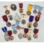 A collection of 20 assorted Masonic jewels, pins and medals to include ribboned Steward medals