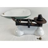 A large vintage 1940's set of enamel scales complete with weights and enamel pan. With remnants of