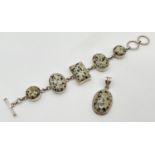 A modern design silver bracelet and matching pendant, set with Dalmatian jasper. Bracelet approx.
