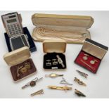 A collection of boxed and unboxed vintage costume jewellery, tie pins & cuff links. Together with