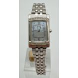 A ladies G670-5043328 mother of pearl faced Eco-Drive wristwatch by Citizen. Stainless steel strap