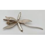 A large vintage silver Taxco pin back brooch/boutonniere in the form of an Orchid flower. Stamped to