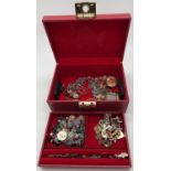 A vintage red jewellery box with lift out tray and contents. Contents include vintage and modern