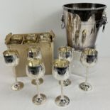 A vintage silver plated wine bucket with lions head finials and loop handles. Together with a set of