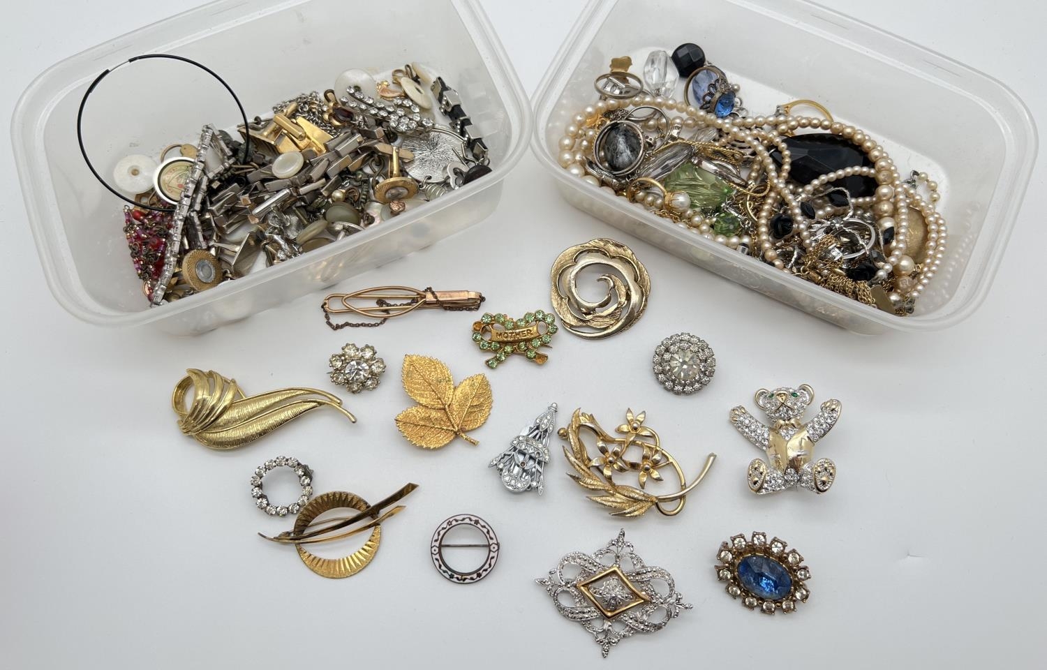 3 tubs of vintage and modern costume jewellery brooches, necklaces earrings, tie pins, cuff links