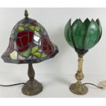 2 metal based Tiffany style table lamps with leaded coloured glass shades. A gilt based lamp with