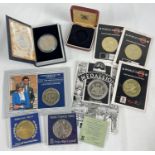A collection of collectors crowns and medallions. To include blister packed World Savers coins,