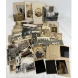 A small 1920's photo album together with a collection of assorted vintage photo's, cabinet cards and