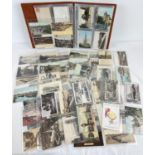 An album containing 160 assorted Edwardian and vintage Norfolk postcards. To include: Great