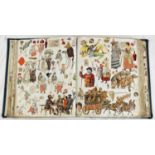 A late Victorian/Edwardian scraps album with cloth pages. To include: flowers, animals, children and