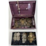 A vintage metal cash tin complete with key containing a collection of British vintage coins,