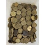 A tub of vintage dodecagon shaped three pence coins. To include sovereign heads of George VI and