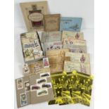 A box of assorted vintage cigarette cards, tea cards and cigarette card albums. To include: John