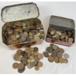 2 tins of antique and vintage British and foreign coins. To include sovereign heads of Victoria,