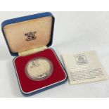 A 1977 silver proof The Queen's Silver Jubilee Commemorative Crown. In original plastic protection