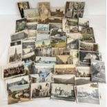 Approx. 475 assorted Edwardian and vintage British and overseas postcards. To include: street