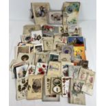 A collection of 100 assorted vintage folding greetings cards.