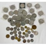 A collection of vintage and antique British and foreign coins and commemorative crowns. To include