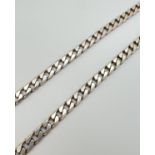 An 18 inch curb chain necklace with lobster claw clasp. Silver marks to the clasp and fixings. Total