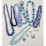 7 vintage costume jewellery bead necklaces to include opaque glass, in varying shades of blue.