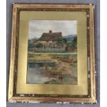 A vintage gilt framed watercolour entitled "A Surrey Cottage" by Annie Beken. In period gilt