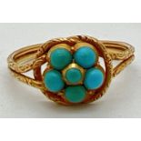 An antique gold lovers knot ring with engraved detail to band and 5 central round cut turquoise