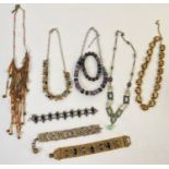 A collection of vintage stone, glass and natural stone set costume jewellery necklaces and