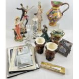 A box of assorted vintage and modern items. To include 3 large resin ornaments of women in period