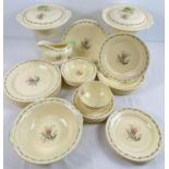 A 1930's New Hall, Hanley, Staffordshire Art Deco ceramic dinner service. With floral spray design