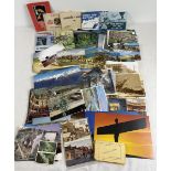 A collection of 150 + vintage and modern postcards and postcard souvenir booklets. To include The