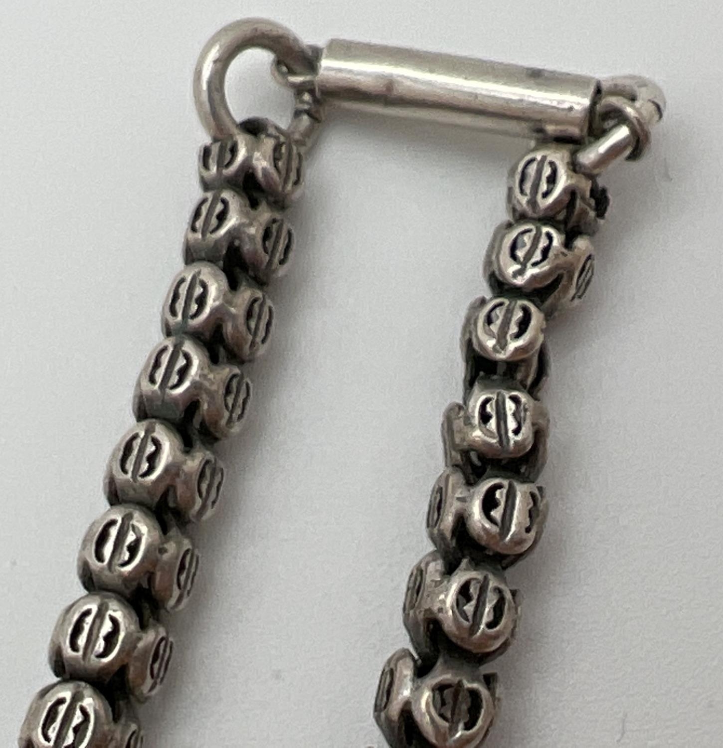 A 17 inch white metal bead chain necklace with pierced detail and barrel push clasp. - Image 3 of 3