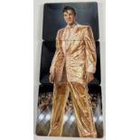 3 Elvis Presley collectors plates that create a portrait of Elvis by Morgan Weistling for Bradford