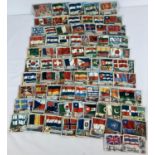 A collection of 73 large and 2 smaller vintage Flags Of The World bubblegum cards by A & BC.