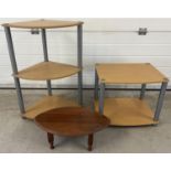 2 modern light wood effect shelving units together with a vintage wooden oval shaped stand.