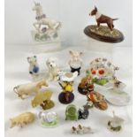 A collection of assorted ceramic & resin animal figurines to include Beswick dog, Beswick mouse,