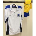 An Everton FC white football shirt with zip collar fastening, size M. Together with a pair of yellow