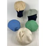 5 1960's viscose hats by Delronne, London, in varying colours and styles.
