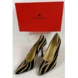 A boxed pair of animal print faux suede stiletto shoes by Charles Jourdan, Paris. US size 8B.