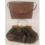 A vintage 1940's leather handbag/satchel together with a modern carpet style handbag with beaded