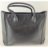 A soft black leather laptop tote work bag by Bree. Complete with detachable shoulder strap. Black