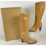 A pair of boxed Tan brown Natural Calf "Chrysler" ladies knee length heeled boots, by Russel &