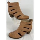 A pair of tan leather ankle boots with cut out detail and cuban heels, by Dkode. Size 39.
