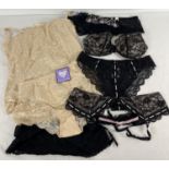 A collection of new/nearly new lingerie items. To include a nude colour lace matching bodice (38B) &