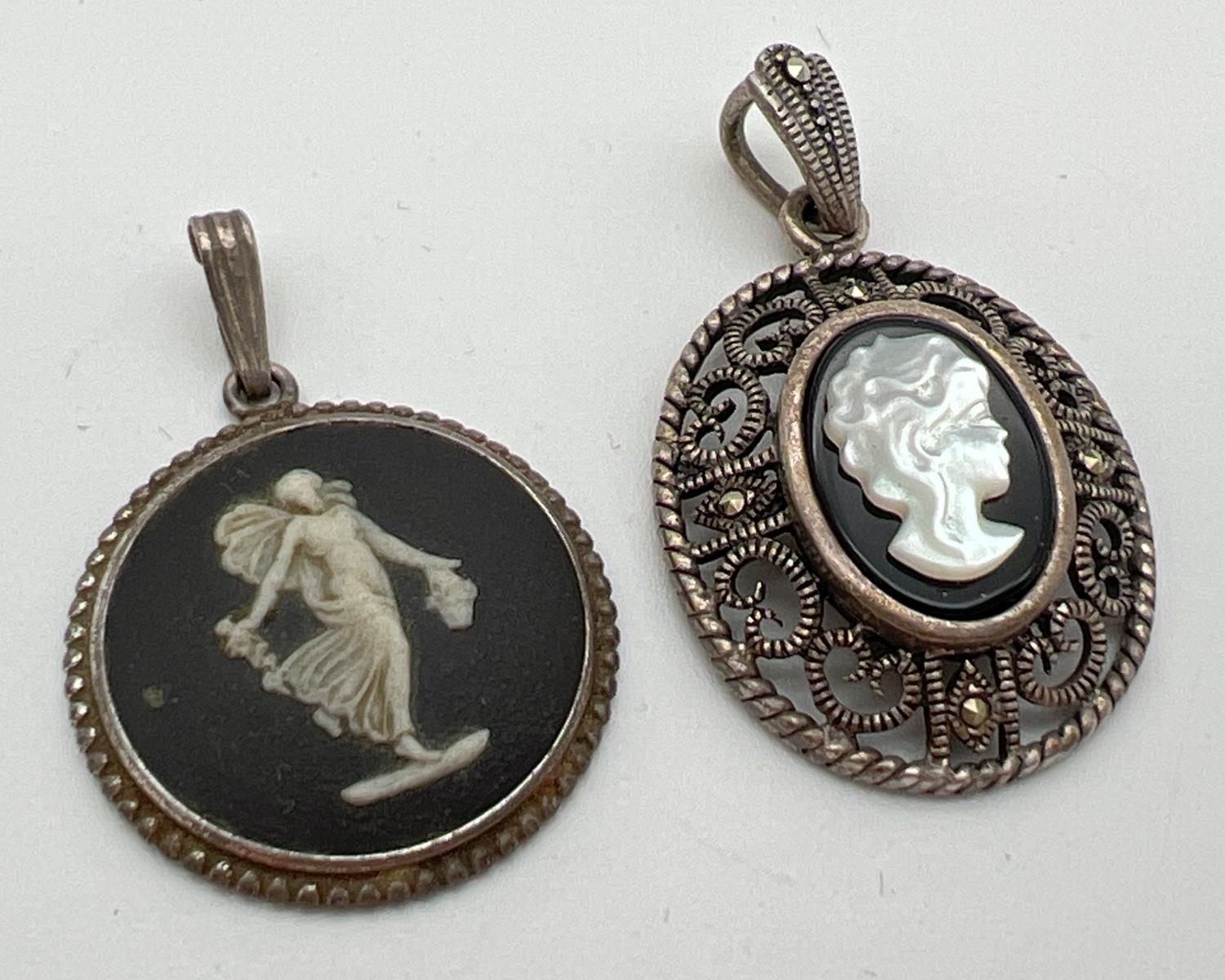 2 vintage silver pendants. A black Jasperware circular shaped pendant, by Wedgwood, together with an