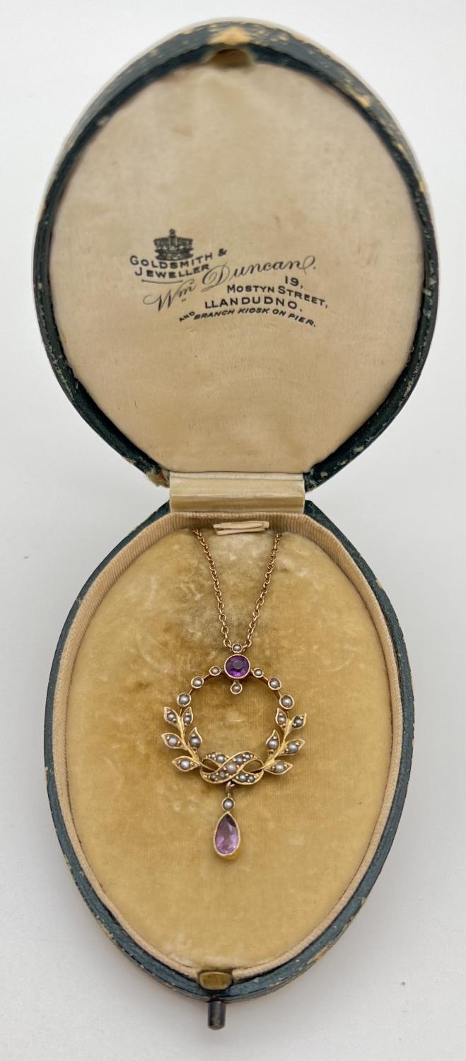 An Art Nouveau 9ct gold necklace set with amethysts and seed pearls, in original silk and velvet - Image 3 of 4