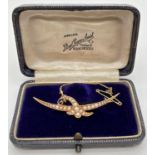 An Edwardian 15ct gold and seed pearl brooch in original box by Lloyd Payne & Amiel, Manchester.