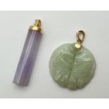 2 jade pendants with 14ct gold fixings and bales. A cylindrical lavender jade pendant with cap