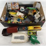 A box of assorted Lego pieces to include boats and vehicles, together with a Lego instruction