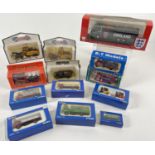 A collection of assorted boxed diecast vehicles to include Official England National Team Coach by