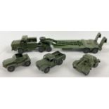 4 vintage Dinky Toys diecast military vehicles. To include #660 Tank transporter, #670 Armored
